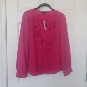 Pink ruffled blouse